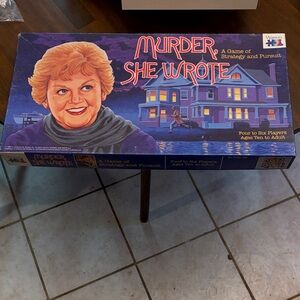 Vintage murder she wrote board game is missing two round markers the color red